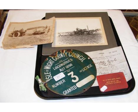 An old circular enamel sign, Isle of Wight County Council locomotive license plate, together with original photograph and pap