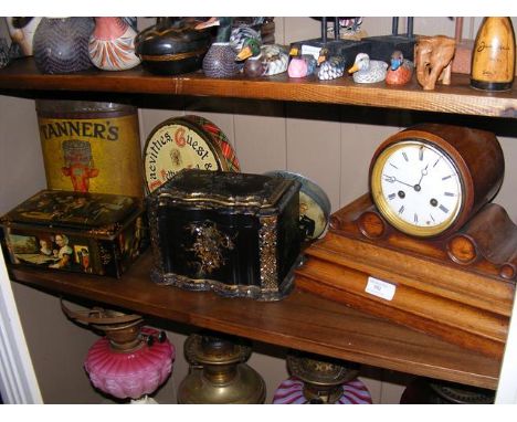 A Victorian papier mache and mother-of-pearl two compartment tea caddy, together with vintage tins and an antique mantel cloc