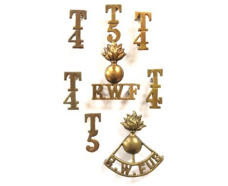 Royal Welsh Fusiliers Brass Shoulder title Badges.  T/5/grenade/RWF ... Grenade/R.W.FUS (3 loops) ... 4 x T/4 ... T/5. All co