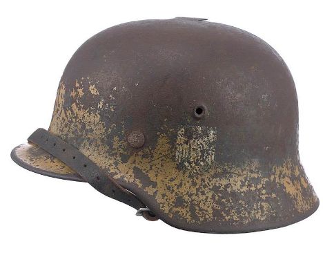 German Third Reich Battle Damaged Army Afrika Korps Single Decal Steel Combat Helmet.  A scarce rolled edge example with Army