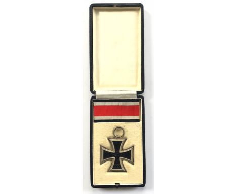 German Third Reich cased 1939 Iron Cross 2nd Class. Fine scarce example with silvered frame and magnetic iron core, the suspe