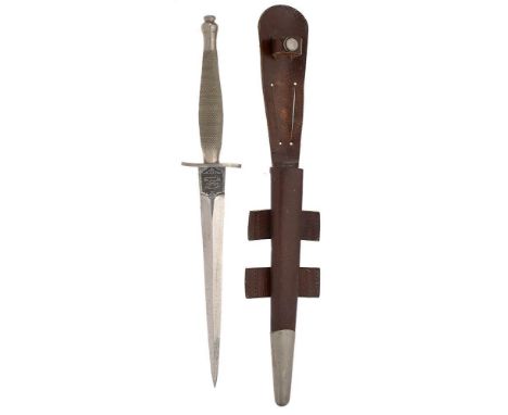 WW2 1st pattern Fairbairn-Sykes Commando fighting knife. A very good and rare example. The hilt with nickel grip of chequered