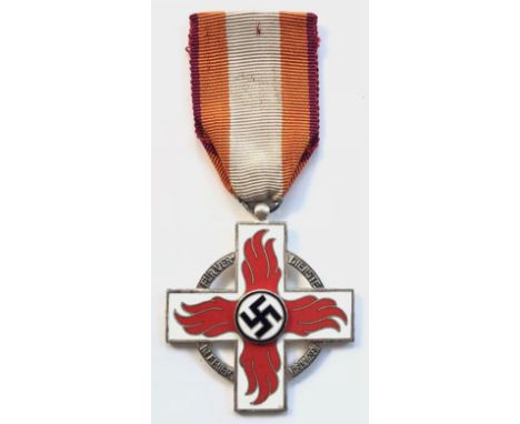 German Third Reich Fire Brigade Decoration 2nd Class.  A good die-cast example. The arms in white enamel with red enamel flam