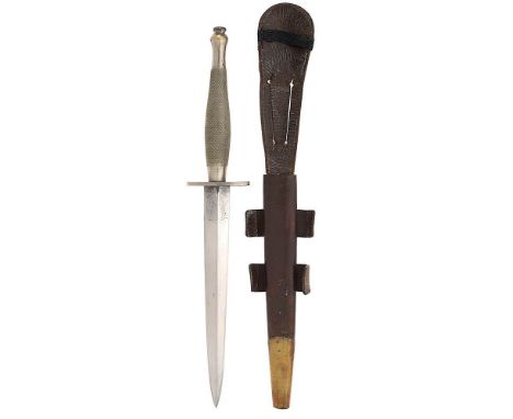 WW2 2nd pattern Fairbairn-Sykes Commando fighting knife.  A good and rare example. The hilt with nickel grip of chequered des