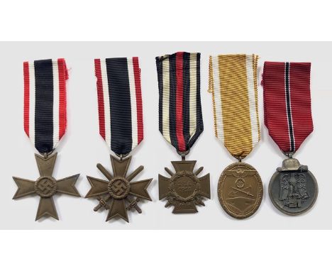 German Third Reich. 5 various medals.  War Merit Cross 2nd Class ... War Merit Cross 2nd Class with swords ... War Merit Meda