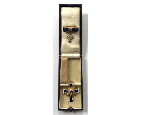 German Third Reich. 1st class Cross of Honour of the German Mother in case of issue with miniature.  A fine gilt example with