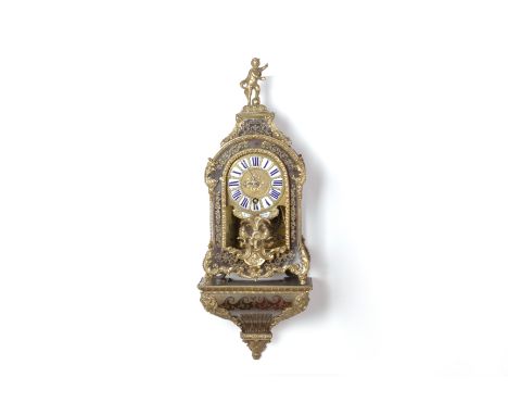 A LOUIS XV ORMOLU MOUNTED AND BRASS INLAID BRACKET CLOCK
Jean-Andre Furet, Paris, 18th Century
The case with putto finial, fo