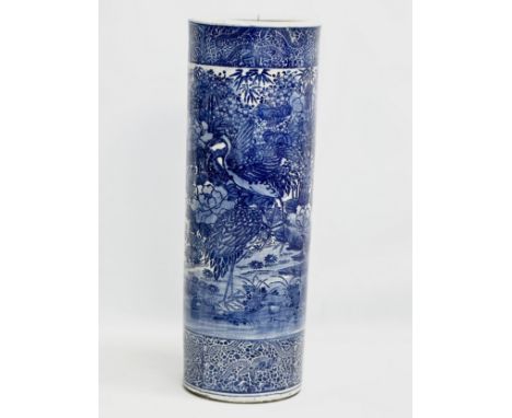A large 19th Century Chinese Late Qing Dynasty blue and white cylinder stick stand/umbrella stand. 22x61cm