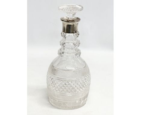 Silver mounted. A Late 19th Century 3 ring glass decanter. Faded mark. London. 27.5cm.