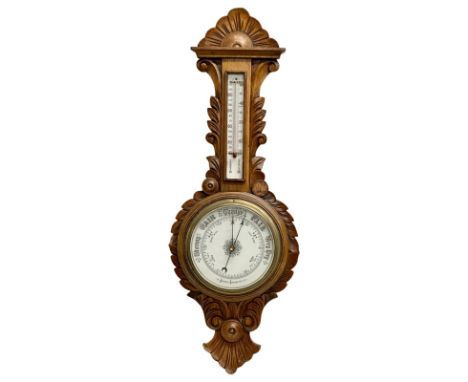 A Late 19th Century Victorian oak barometer. 31x88cm