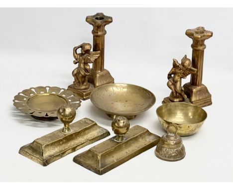 A quantity of 19th and 20th Century brassware. Together with a pair of modern gilt ceramic cherub candlesticks.