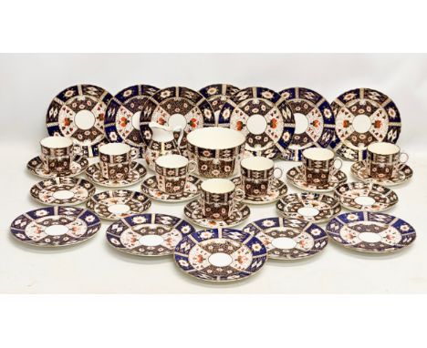 A 32 piece 19th/Early 20th Century Imari pattern tea service. Red Crown and 2 Swords Mark.