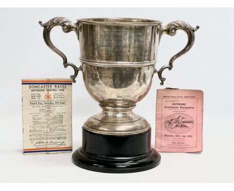 A large silver Greyhound Racing Celtic Park “The Nesbitt Cup” June 1928. Winner Cresta Run. 1178.85 grams. 38x20x34cm