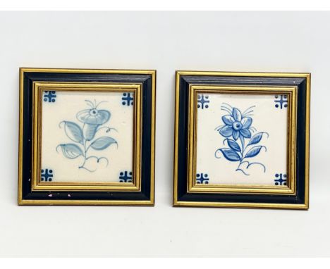 A pair of framed vintage ceramic tiles. 19.5x19.5cm.