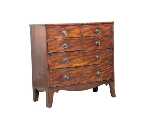 A Late George III inlaid mahogany chest of drawers on sprayed bracket feet. Circa 1800-1810. 107x50x107cm(4)