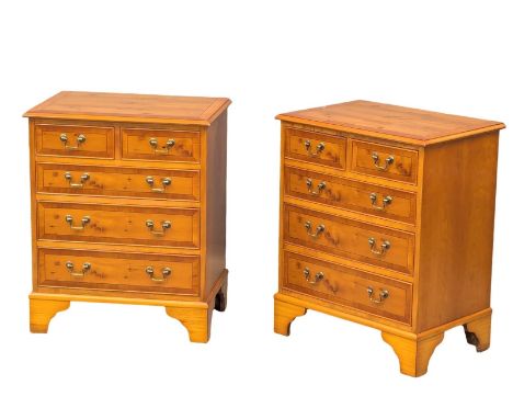 A pair of Georgian style inlaid yew wood chest of drawers on bracket feet. 62.5x41.5x76cm.(9)