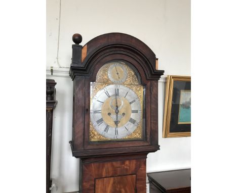 An 18th century mahogany and oak cased longcase clock, the hood with shell marquetry inlay to the pediment above an arched gl