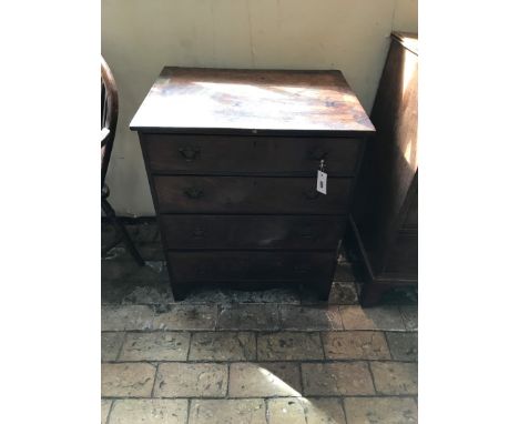 A reproduction mahogany chest of four long drawers on bracket feet. 25 1/4" wide. (a/f).