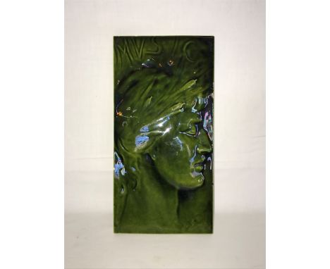 George James Frampton, an Arts & Crafts rectangular tile ‘Music’, decorated with a profile depiction of the ‘God of Music’.  