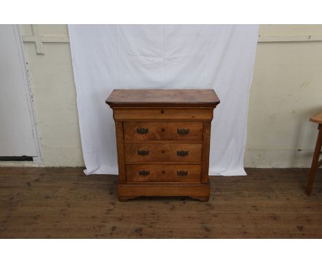 A mahogany chest with concealed frieze drawer above three long drawers, on a plinth base with concealed drawer and on bracket
