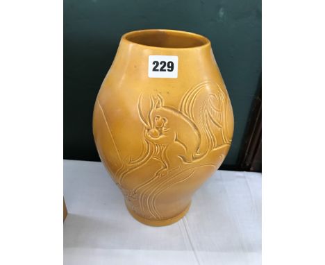 A Susie Cooper vase decorated with squirrels. Est £70-100