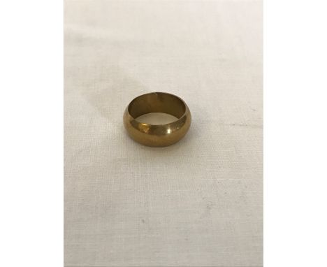 A gold coloured metal ring stamped to interior 750 18k with bulbous exterior.  Est £40-60