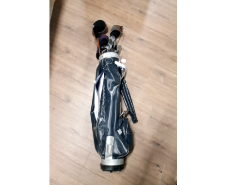 A DUNLOP GOLF BAG CONTAINING CLUBS INCLUDING PING