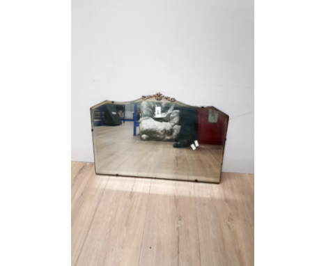A VINTAGE FRAMELESS MIRROR