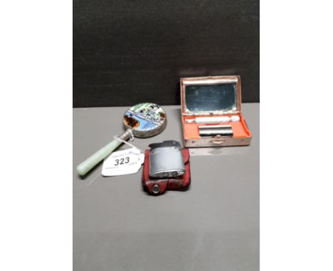 A JAPANESE JADE HANDLED PORCELAIN MIRROR TOGETHER WITH A RONSON FLINT LIGHTER AND FLYING EAGLE RAZOR SET