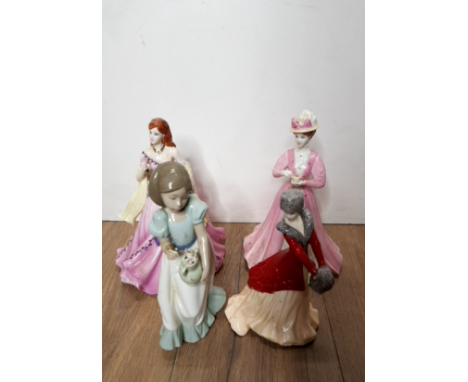 TWO COALPORT LADY FIGURES OLIVIA AND EMILY TOGETHER WITH ONE NAO FIGURE AND A ROYAL WORCESTER FIGURE LARA CHRISTMAS MORNING