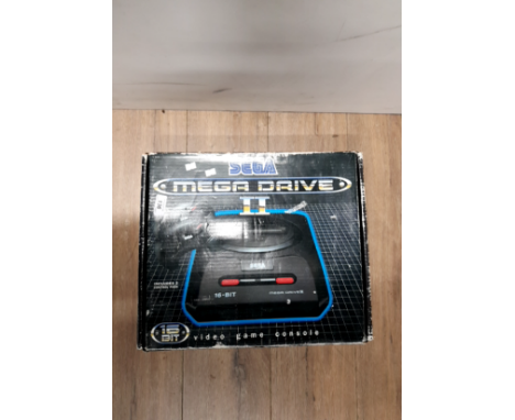 A BOXED SEGA MEGA DRIVE TWO GAMES CONSOLE