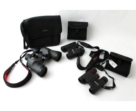 Three pairs of binoculars, Swift Audubon 8.5 x 44 field glasses and two Minox pairs 