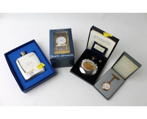 Two hip flasks, small quartz mantel clock and Pulsar nurses style watch