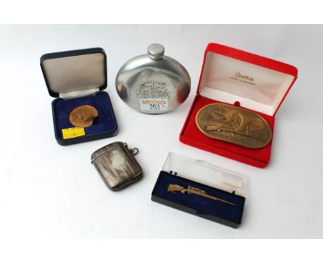 Wetherby sporting buckle, rifle brooch, hip flask, Vesta case and sporting medal