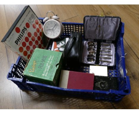 Kodak folding camera, Ensign Ful-Vue camera, binoculars, napkin rings, clock, spoons, etc 