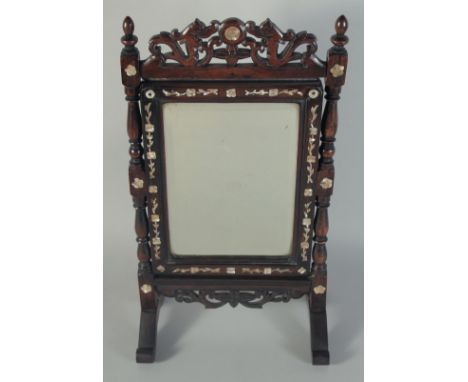 A 19TH CENTURY CHINESE MOTHER OF PEARL INLAID HARDWOOD MIRROR ON STAND, 45cm high, 24.5cm wide overall.