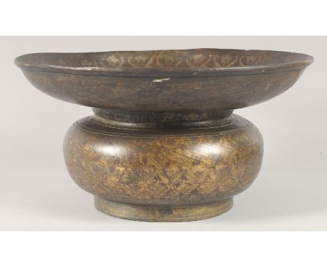 A FINE INDIAN BRONZE BASIN, with foliate decoration, 34cm diameter.