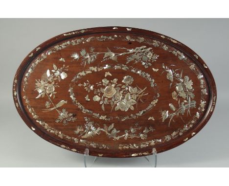 A CHINESE MOTHER OF PEARL INLAID HARDWOOD OVAL-FORM TRAY, finely decorated with various birds and native flora, 63.5cm x 41.5