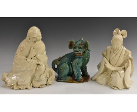 A 19th century Chinese Blanc de Chine figure, of a sage, seated with a scroll, typical flowing robes, 25cm high; another, sim