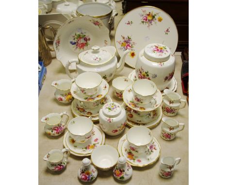 A Royal Crown Derby Posies pattern tea set, including large teapot, biscuit barrel, tea caddy, milk jugs, sugar bowls, cups, 