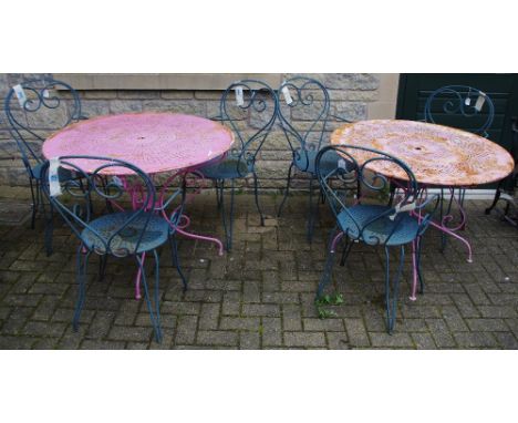 Two metal garden tables, pierced circular top, wrought legs, six conforming chairs (8)