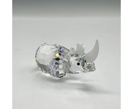 This retired clear crystal figure with long hexagonal pattern cuts, black crystal eyes and a frosted crystal horn was part of