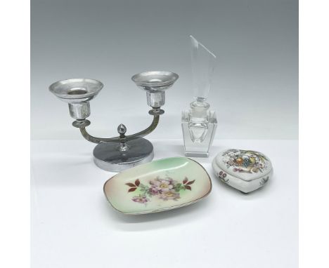 This eclectic grouping includes a brilliant Crystal Flacon, a Farberware Brooklyn aluminum two-candle candelabra, a porcelain