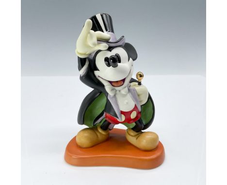 This figurine was the Walt Disney Collector's Society Membership sculpture and depicts Mickey Mouse in a Magician's outfit. T