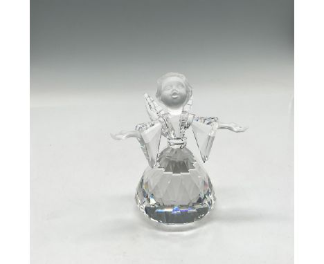 Clear crystal figure with frosted face and hands. Part of the Cheerful Times theme group. Swarovski backstamp. 194761. This i