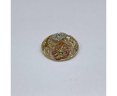 The Garden of Tranquility series was Swarovski's second annual edition of collectable pins. This pin, titled Harmony, has whi