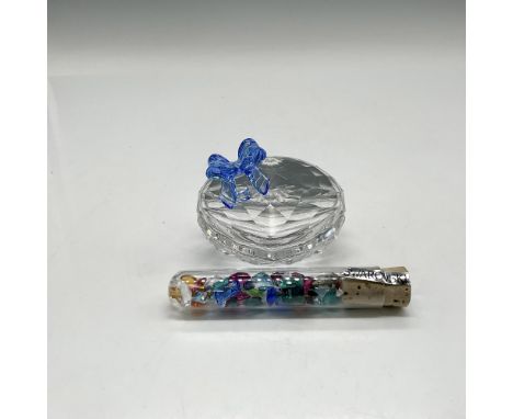 Part of the Exquisite Accents group is a lidded heart shaped box adorned with blue crystal ribbon. Tube of multicolored cryst