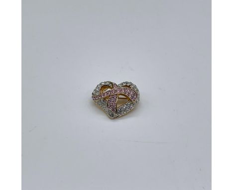 Crystal heart pin draped with a pink crystal ribbon. This item has its original box. Measures: 3.5"L x 3.5"W x 1.5"H. Certifi