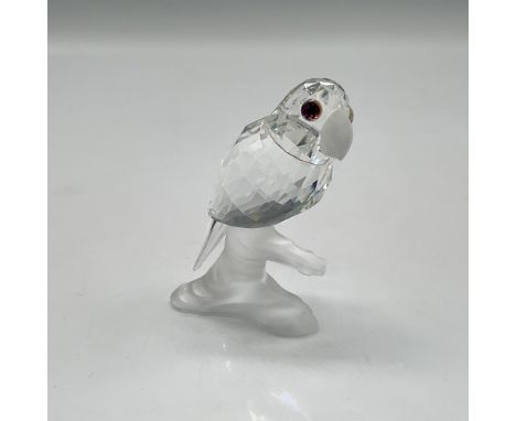 This retired crystal figure is part of the Up in the Trees theme group. Made from clear crystal with frosted beak and sits on