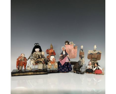 Includes two traditional Japanese paper dolls, one Kimekomi style doll wearing a wig and a colorful robe, a Gosho doll featur